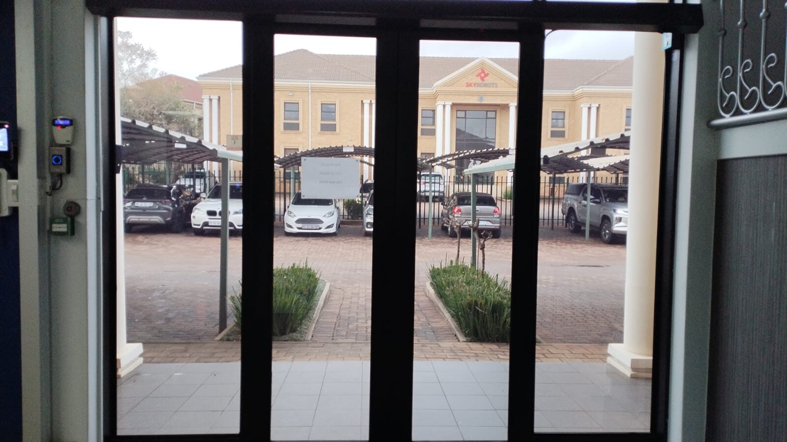 Modern aluminium shopfront doors installed by Lashan Aluminium in Zimbabwe