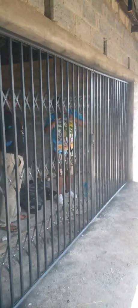 Custom folding trellis security gate